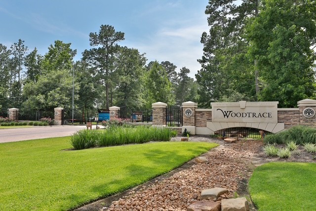 2008 Green Terrace Lane Pinehurst, TX 77362 - Photo 40 of 47 Woodtrace gated entrance to your new home.
