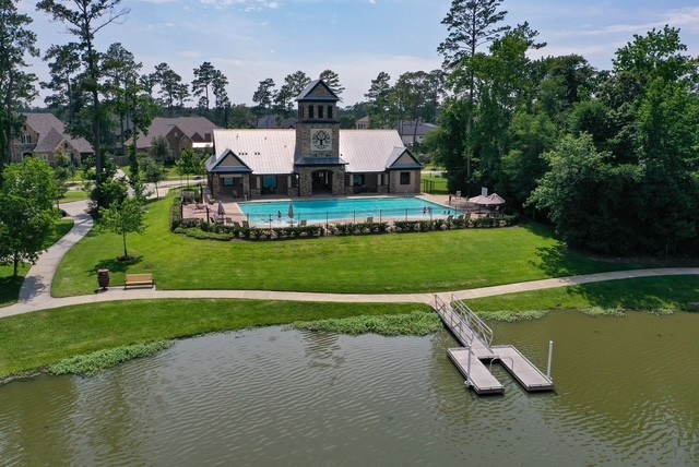 2008 Green Terrace Lane Pinehurst, TX 77362 - Photo 41 of 47 Lakefront community center and pool