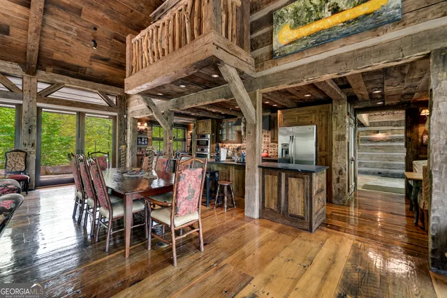 a bathroom with a bathtub and next to a window