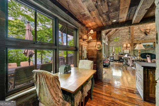 a living room with furniture gym equipment and a flat screen tv