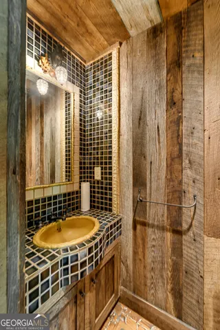 a kitchen with stainless steel appliances granite countertop a stove and cabinets