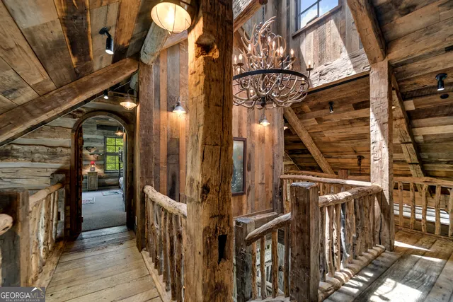 a bathroom with a sink shower and a mirror