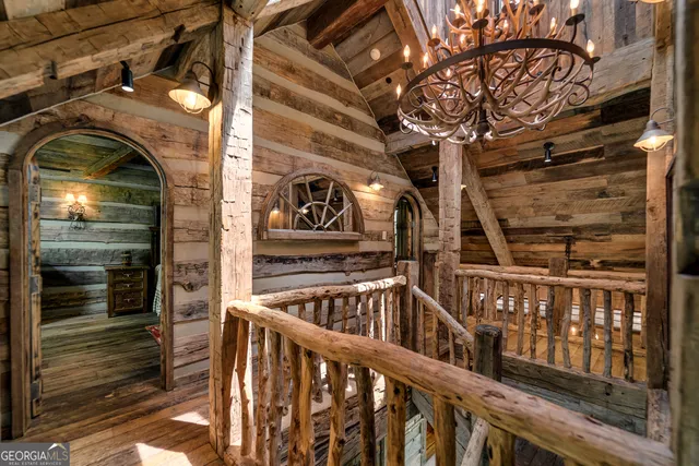 a bathroom with a double vanity sink a mirror and a bathtub