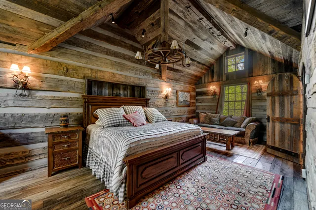 a view of a backyard with table and chairs