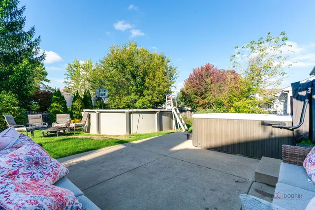 a view of a swimming pool with a patio