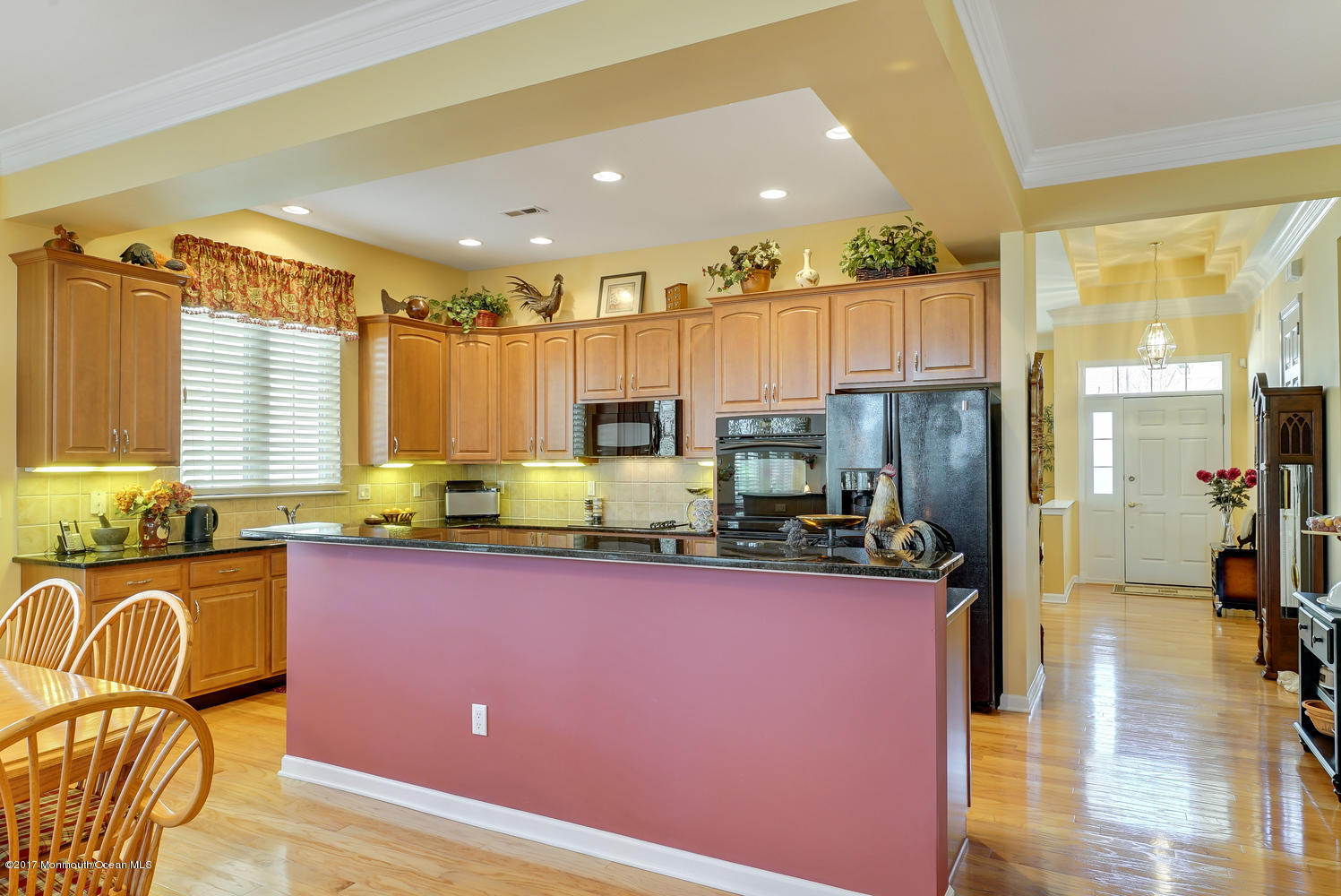 88 Crooked Stick Road Jackson, NJ 08527 - Photo 25 of 41 a kitchen with stainless steel appliances granite countertop a sink a stove and a refrigerator