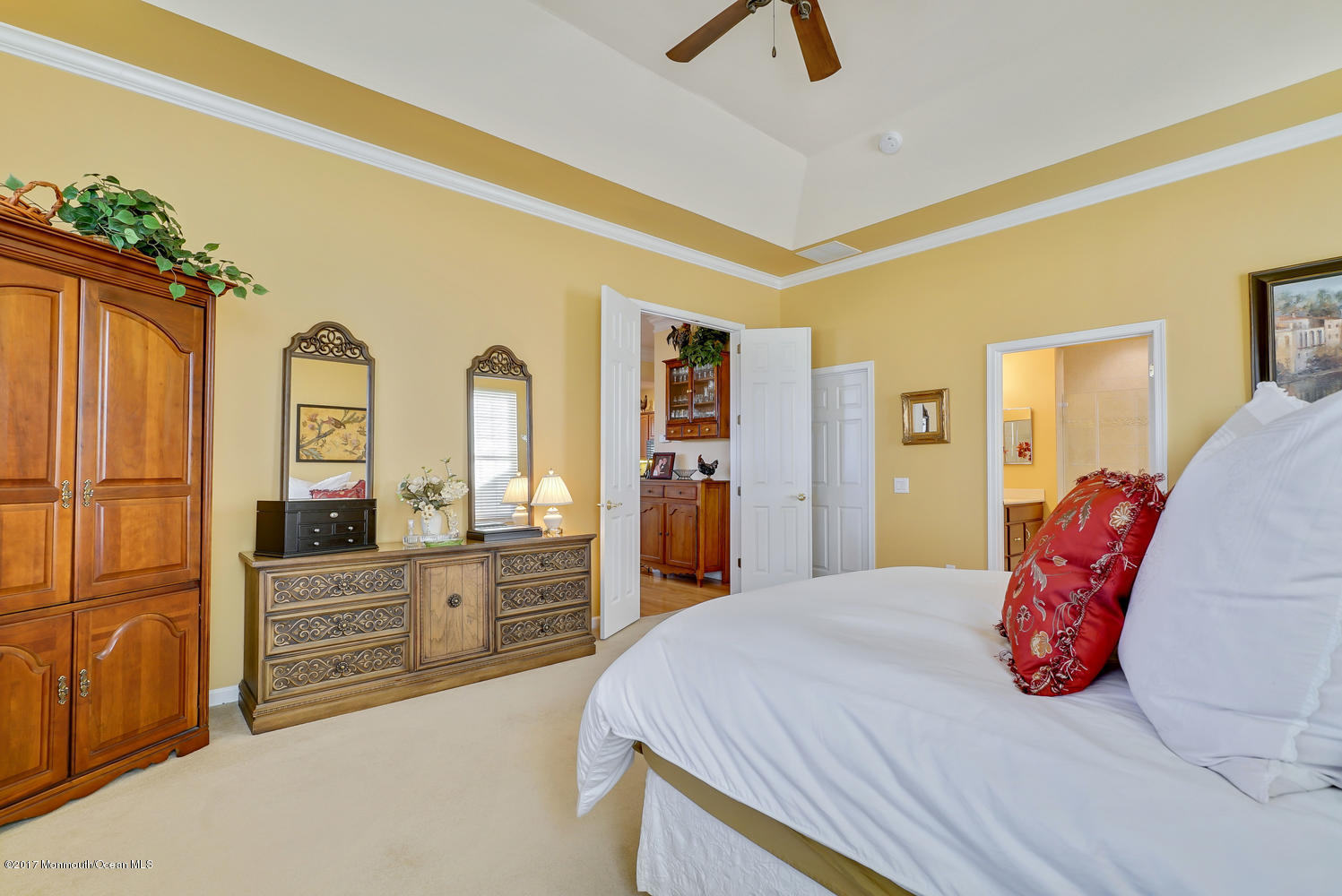 88 Crooked Stick Road Jackson, NJ 08527 - Photo 34 of 41 a bedroom with a large bed and dresser