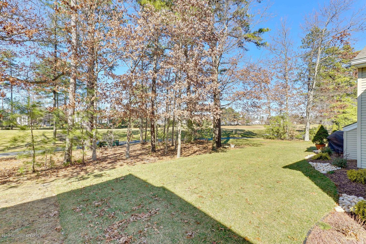 88 Crooked Stick Road Jackson, NJ 08527 - Photo 38 of 41 a view of a yard with swimming pool