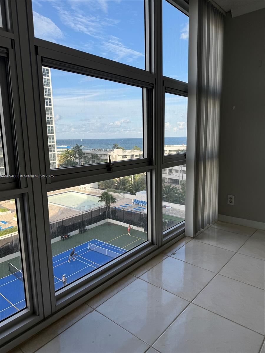 525 North Ocean Boulevard, Unit 920 Pompano Beach, FL 33062 - Photo 11 of 38 a view of a back yard from a window