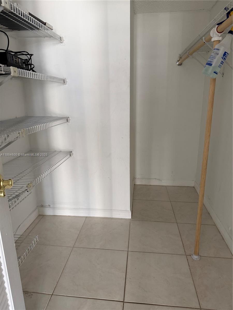 525 North Ocean Boulevard, Unit 920 Pompano Beach, FL 33062 - Photo 13 of 38 a view of a room with shelf