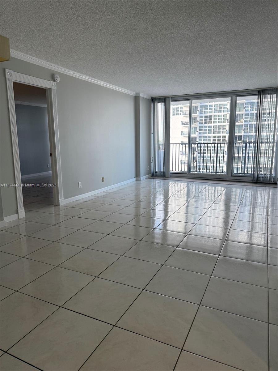 525 North Ocean Boulevard, Unit 920 Pompano Beach, FL 33062 - Photo 8 of 38 a view of an empty room and window