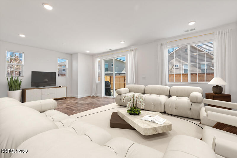 2020 Cradle Mountain Drive, Unit 3 Reno, NV 89523 - Photo 11 of 29 a living room with furniture and a flat screen tv