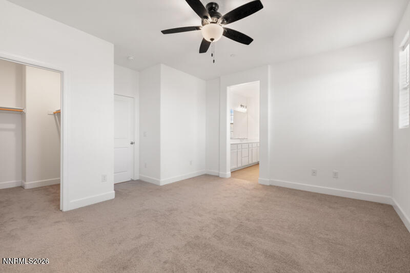 2020 Cradle Mountain Drive, Unit 3 Reno, NV 89523 - Photo 19 of 29 an empty room with closet and windows