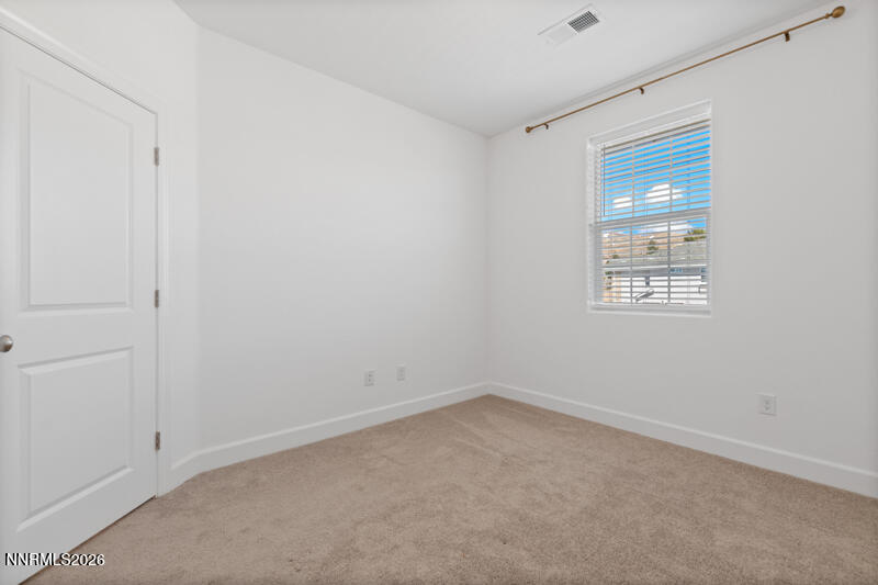 2020 Cradle Mountain Drive, Unit 3 Reno, NV 89523 - Photo 23 of 29 an empty room with a window