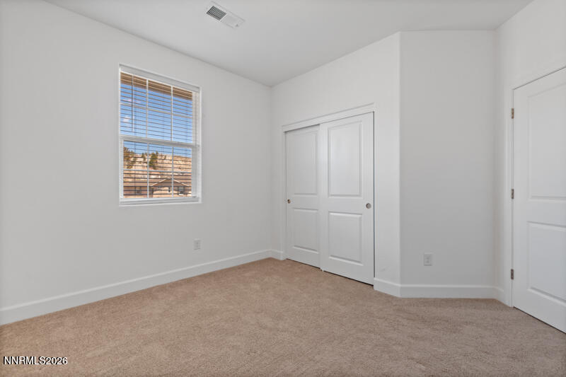 2020 Cradle Mountain Drive, Unit 3 Reno, NV 89523 - Photo 26 of 29 a view of an empty room with a window