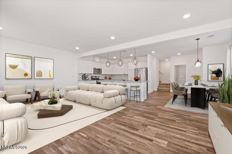 2020 Cradle Mountain Drive, Unit 3 Reno, NV 89523 - Photo 8 of 29 a living room with furniture white walls and white walls