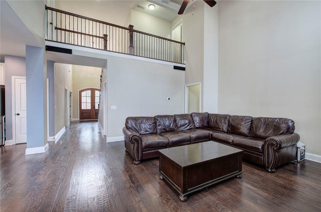 18 Weather View Trail Cartersville, GA 30121 - Photo 19 of 78 a living room with furniture and a wooden floor