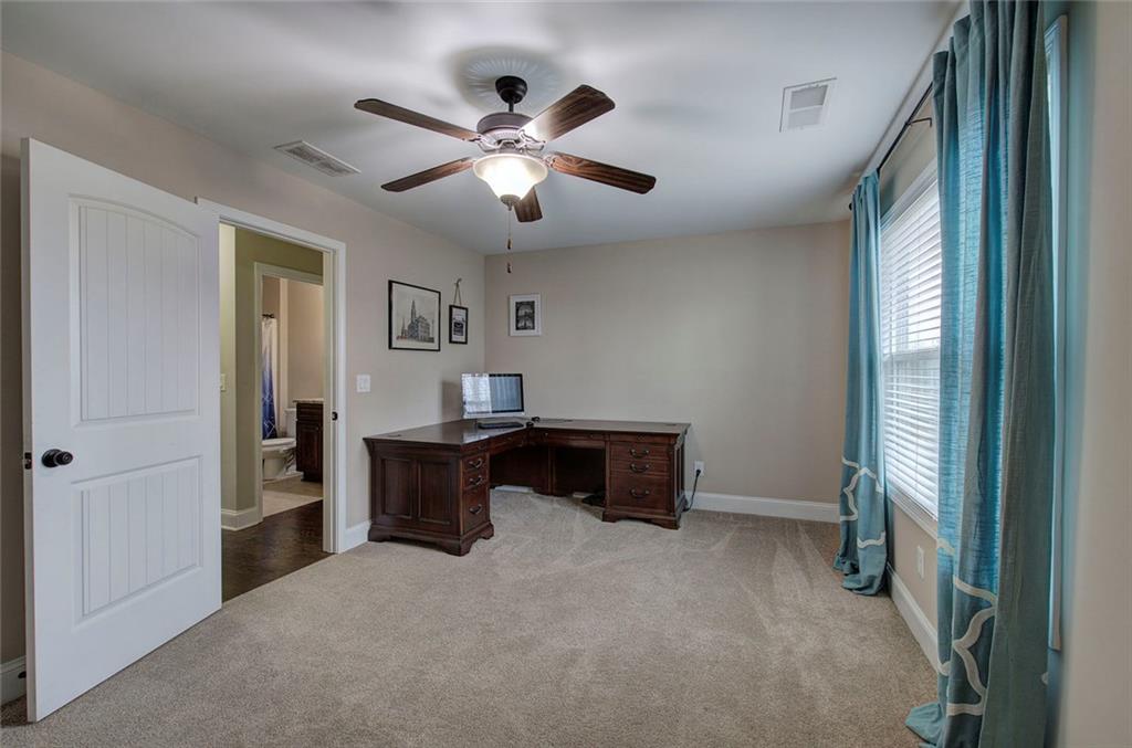 18 Weather View Trail Cartersville, GA 30121 - Photo 36 of 78 a living room with furniture and a chandelier