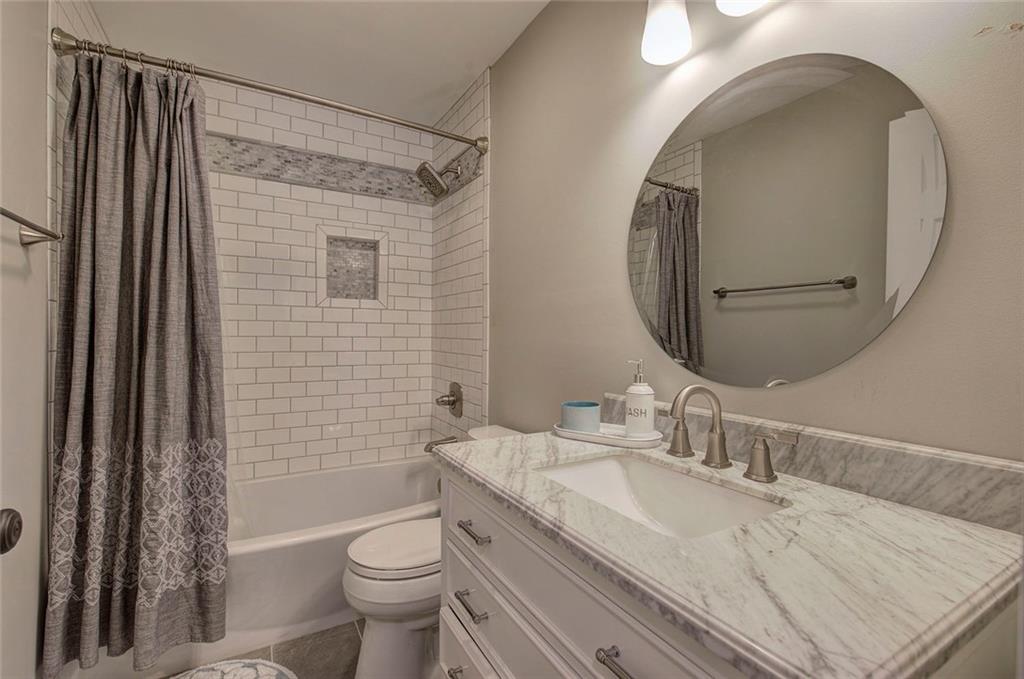 18 Weather View Trail Cartersville, GA 30121 - Photo 50 of 78 a bathroom with a granite countertop sink toilet and shower