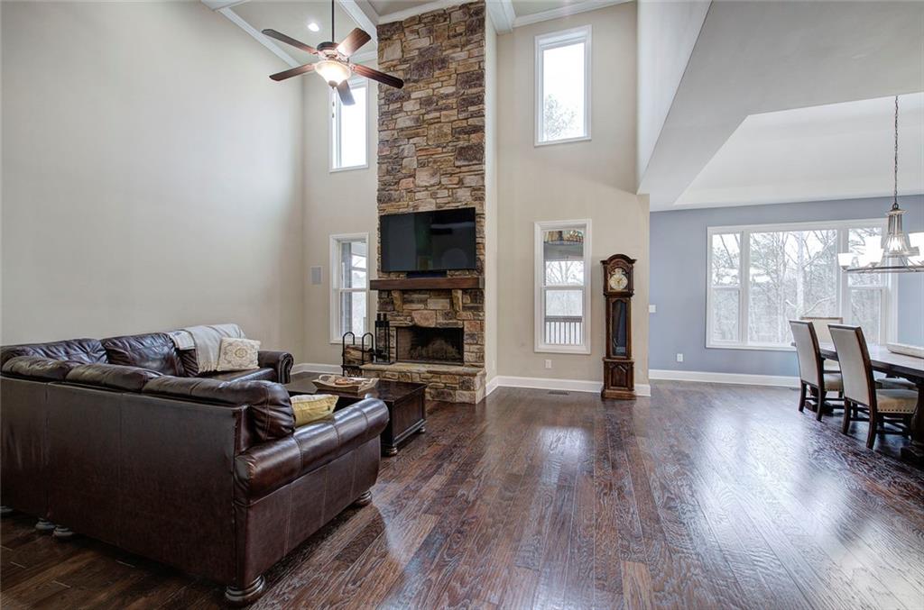 18 Weather View Trail Cartersville, GA 30121 - Photo 5 of 78 a living room with furniture and a fireplace