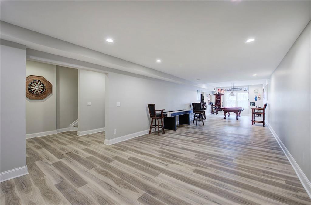 18 Weather View Trail Cartersville, GA 30121 - Photo 57 of 78 a view of a livingroom with furniture and wooden floor
