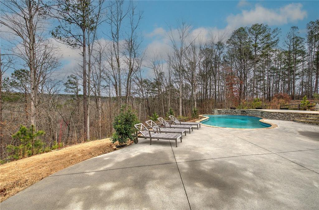 18 Weather View Trail Cartersville, GA 30121 - Photo 68 of 78 a view of a bench with fire pit