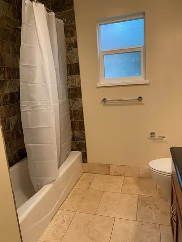 a bathroom with a sink and a toilet