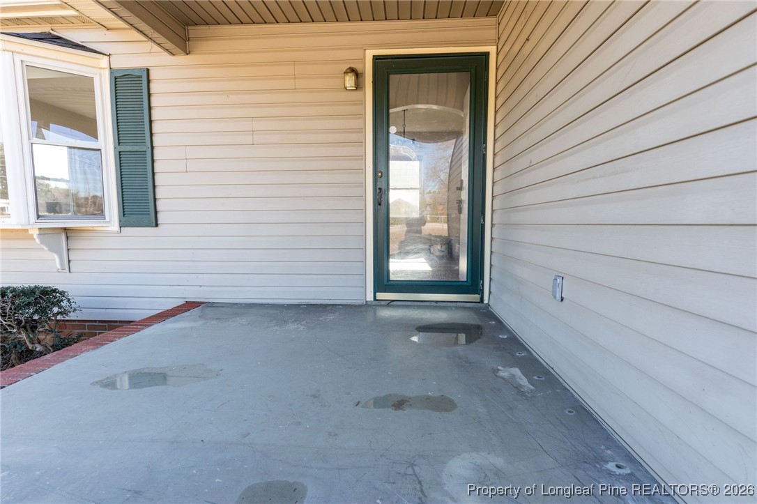 6341 Cliffdale Road Fayetteville, NC 28314 - Photo 5 of 20 a view of a house with a garage
