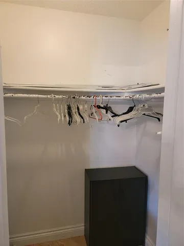 a view of a room with racks on the wall