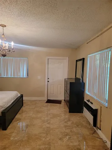 a view of a livingroom with furniture