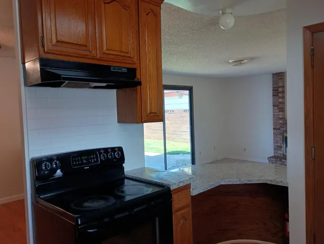 a view of a room that has a window in it