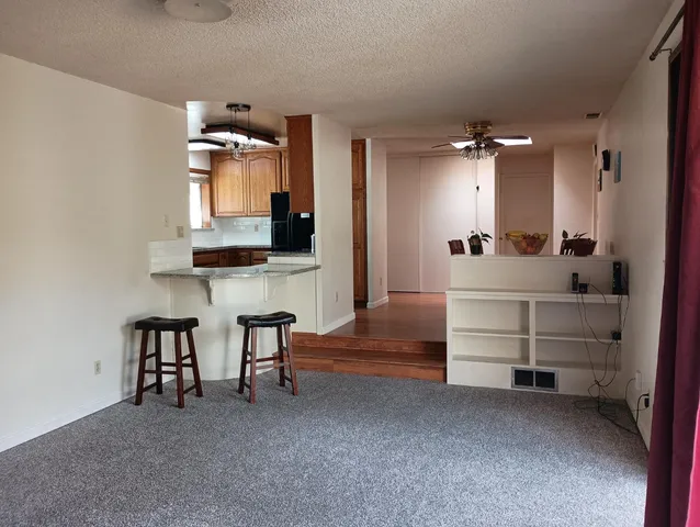 a view of a room that has a window in it