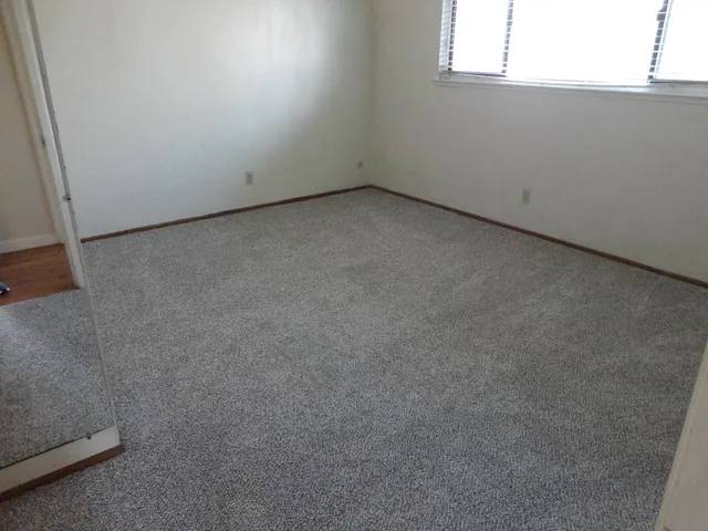 a bathroom with a toilet and a sink