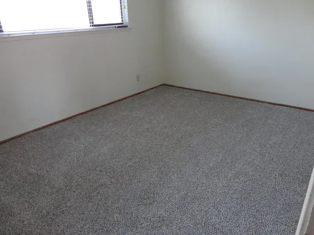 a view of a back yard of the house