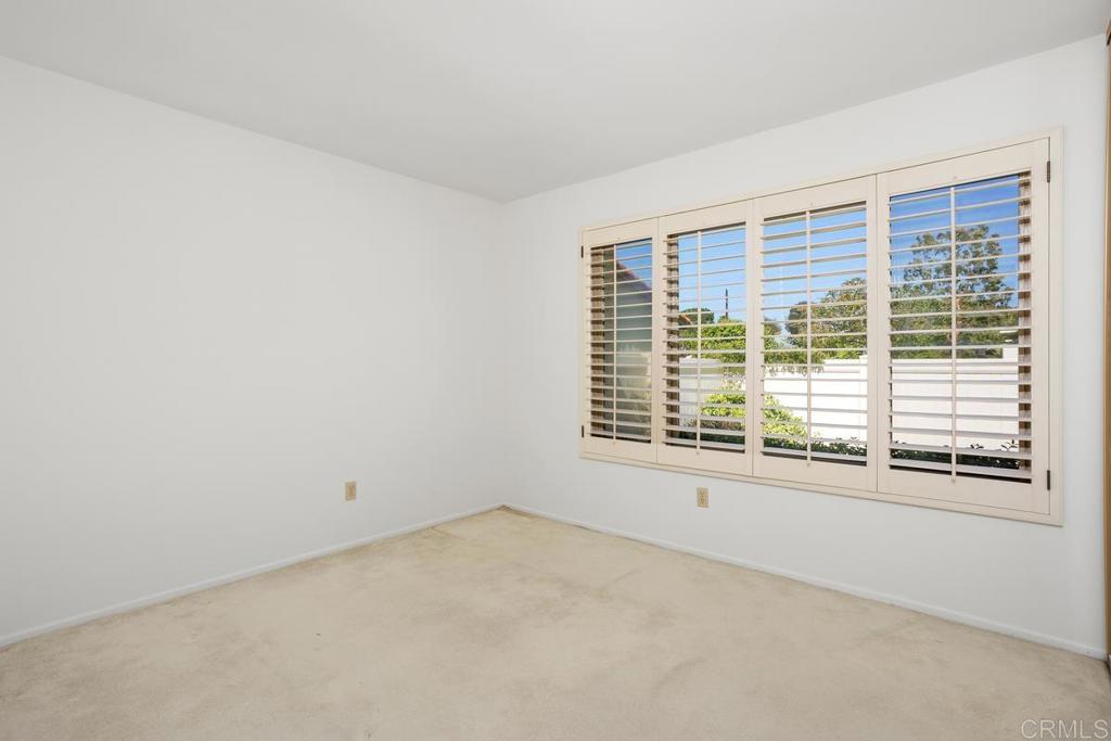 1640 Forestdale Drive Encinitas, CA 92024 - Photo 8 of 20 a view of an empty room with a window