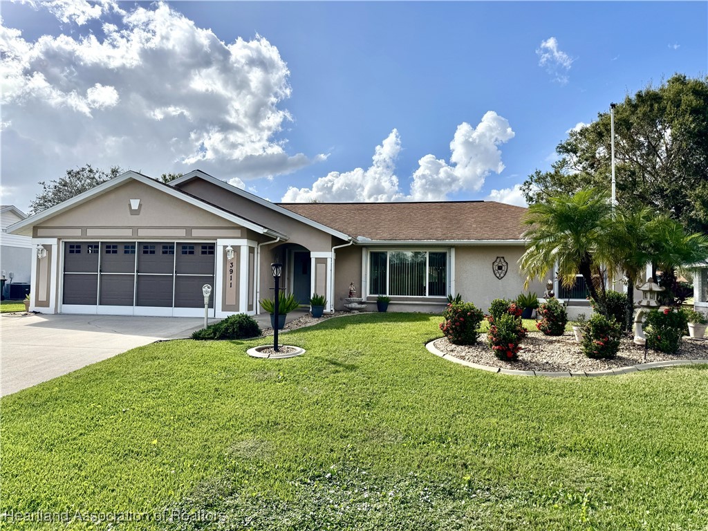 3911 Loquat Road Sebring, FL 33875 - Photo 1 of 38 Front