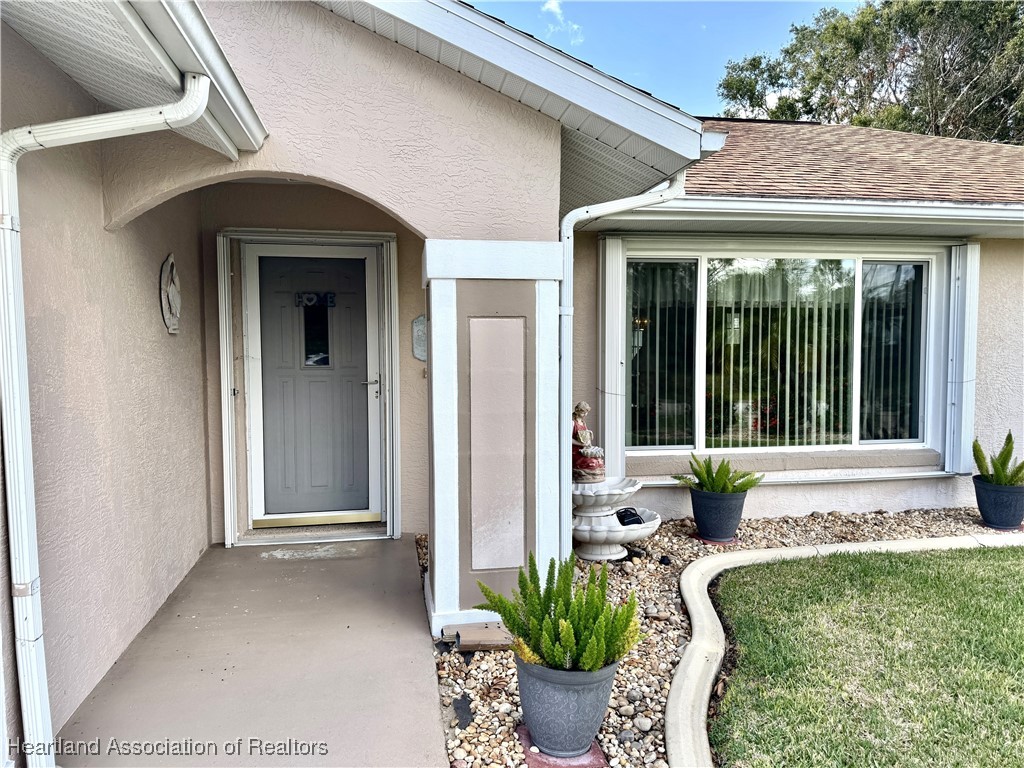 3911 Loquat Road Sebring, FL 33875 - Photo 3 of 38 Front Entry