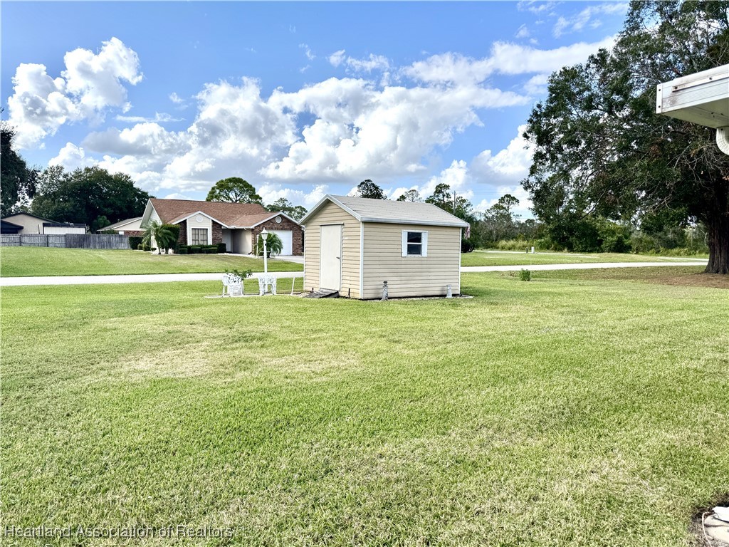 3911 Loquat Road Sebring, FL 33875 - Photo 31 of 38 Rear Yard