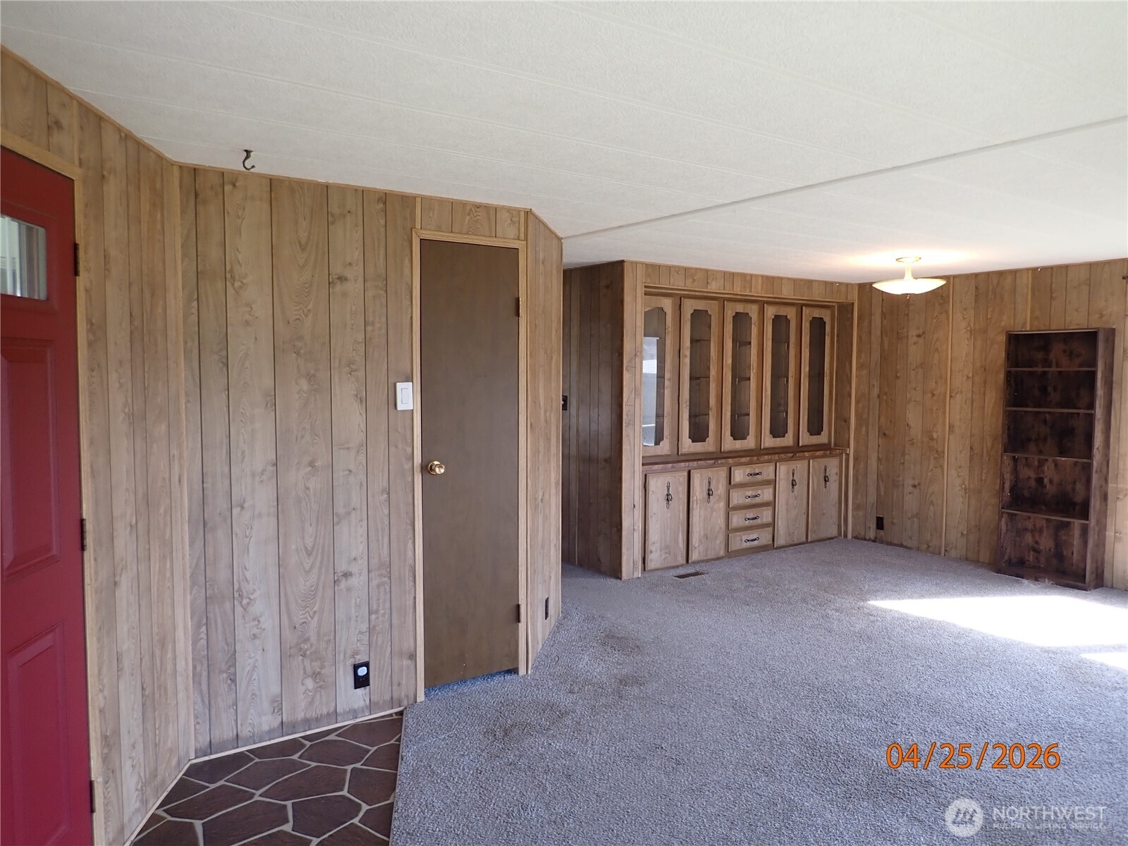 9217 183rd Avenue Southwest Rochester, WA 98579 - Photo 12 of 26 a view of an empty room with a cabinet