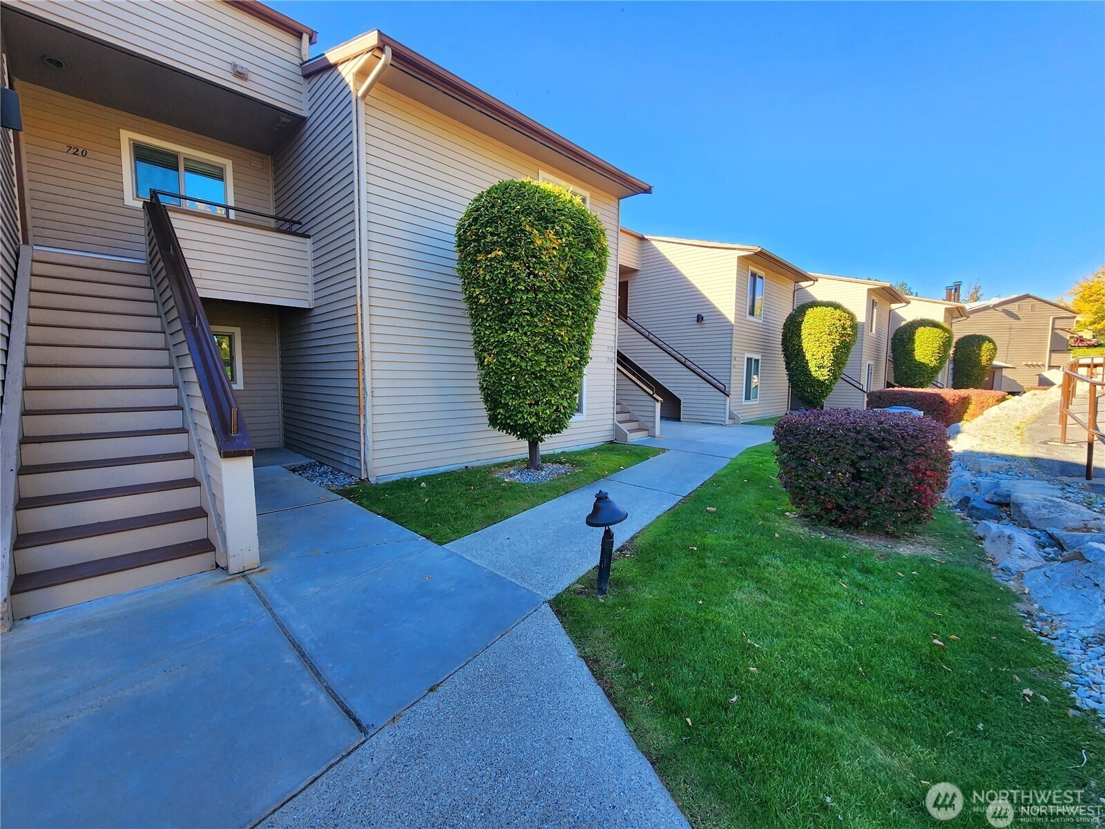 1 Lakeside 719-m Manson, WA 98831 - Photo 4 of 40 a front view of a house with garden