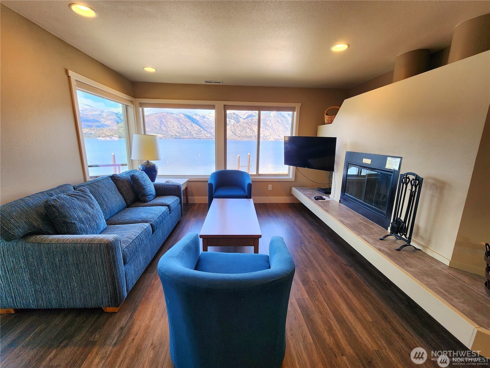 1 Lakeside 719-m Manson, WA 98831 - Photo 7 of 40 a living room with furniture and a large window