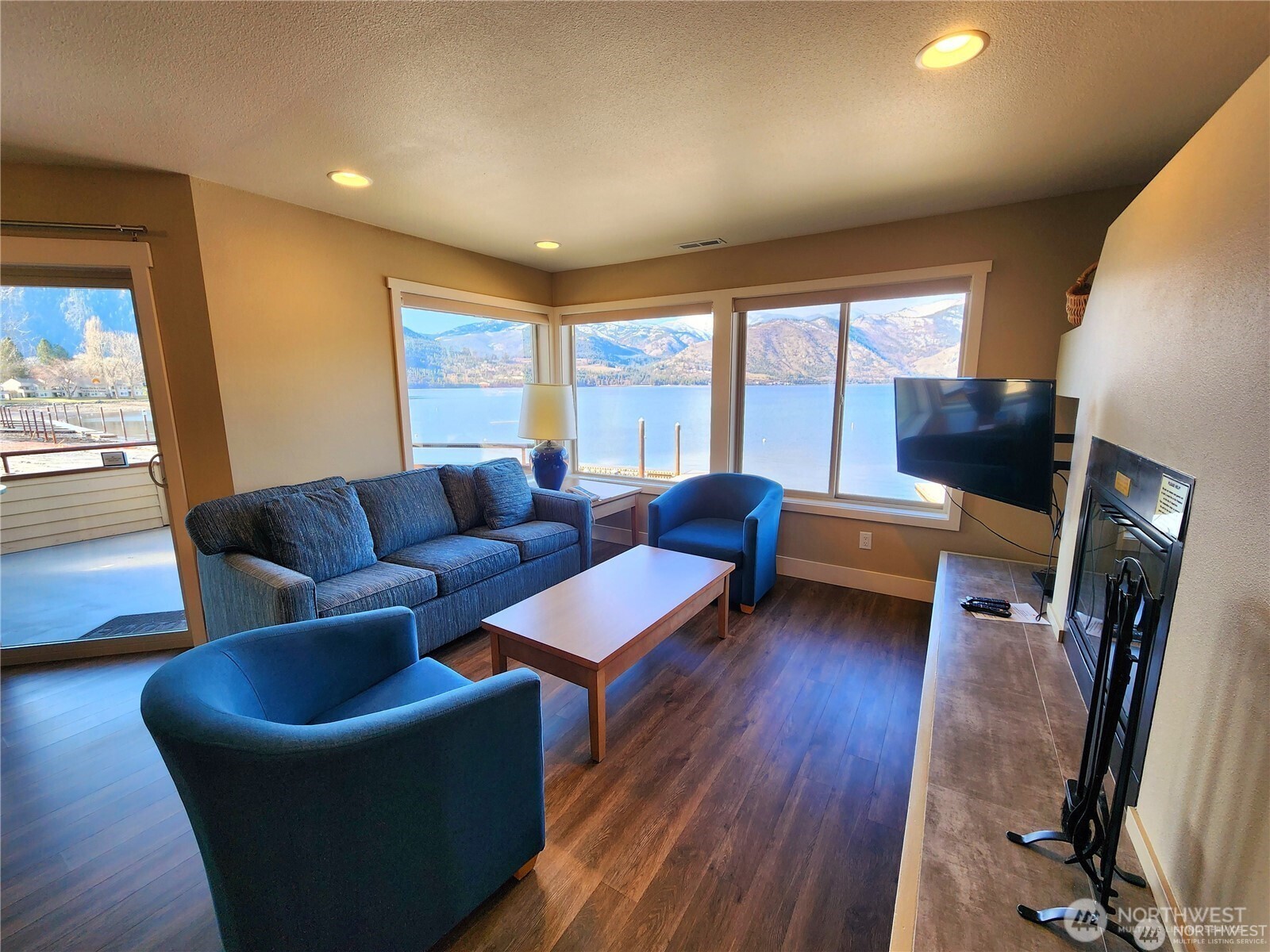 1 Lakeside 719-m Manson, WA 98831 - Photo 10 of 40 a living room with furniture and a flat screen tv
