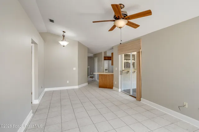 a view of an empty room and window