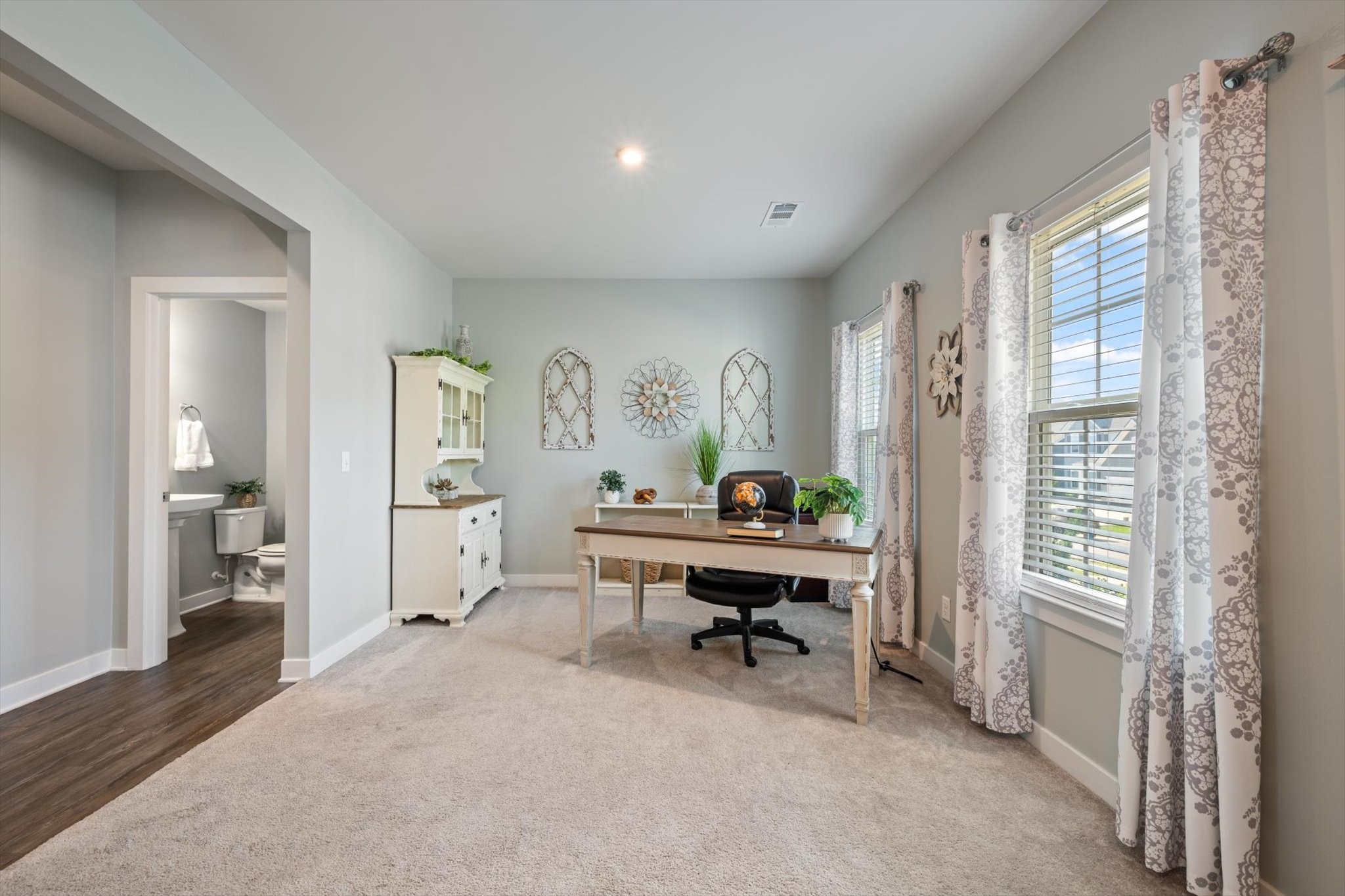 910 Caywood Road Smyrna, TN 37167 - Photo 3 of 49 a view of a workspace with furniture and a window