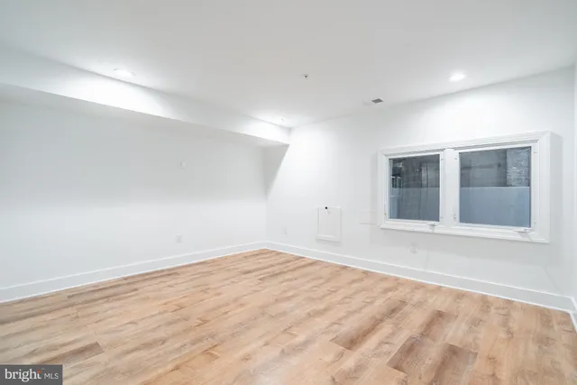 a stove top oven sitting inside of a kitchen