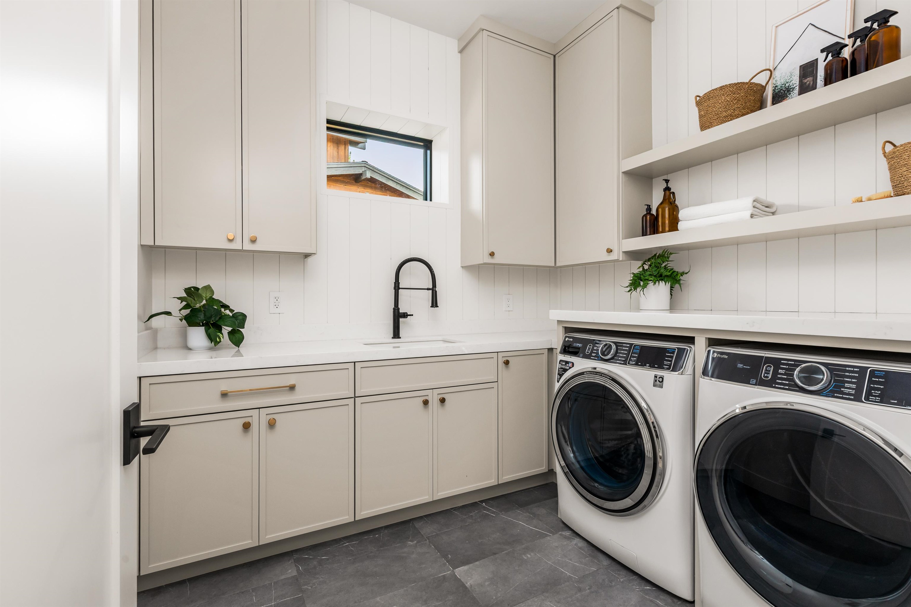 11051 Ghirard Road Truckee, CA 96161 - Photo 18 of 23 a view of a kitchen with sink washer and dryer