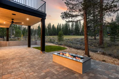 a view of backyard with a small cabin