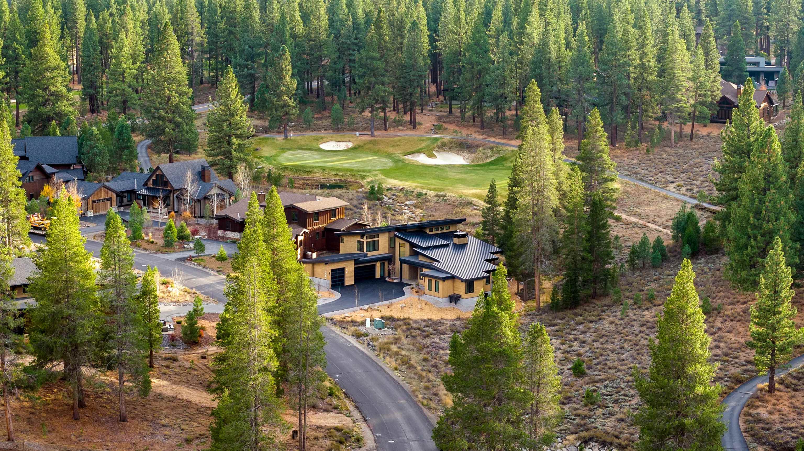 11051 Ghirard Road Truckee, CA 96161 - Photo 3 of 23 a view of swimming pool with a patio and a yard