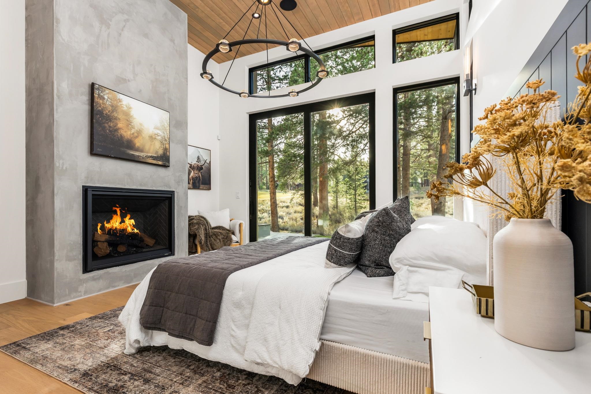 11051 Ghirard Road Truckee, CA 96161 - Photo 10 of 23 a bedroom with bed and a fireplace