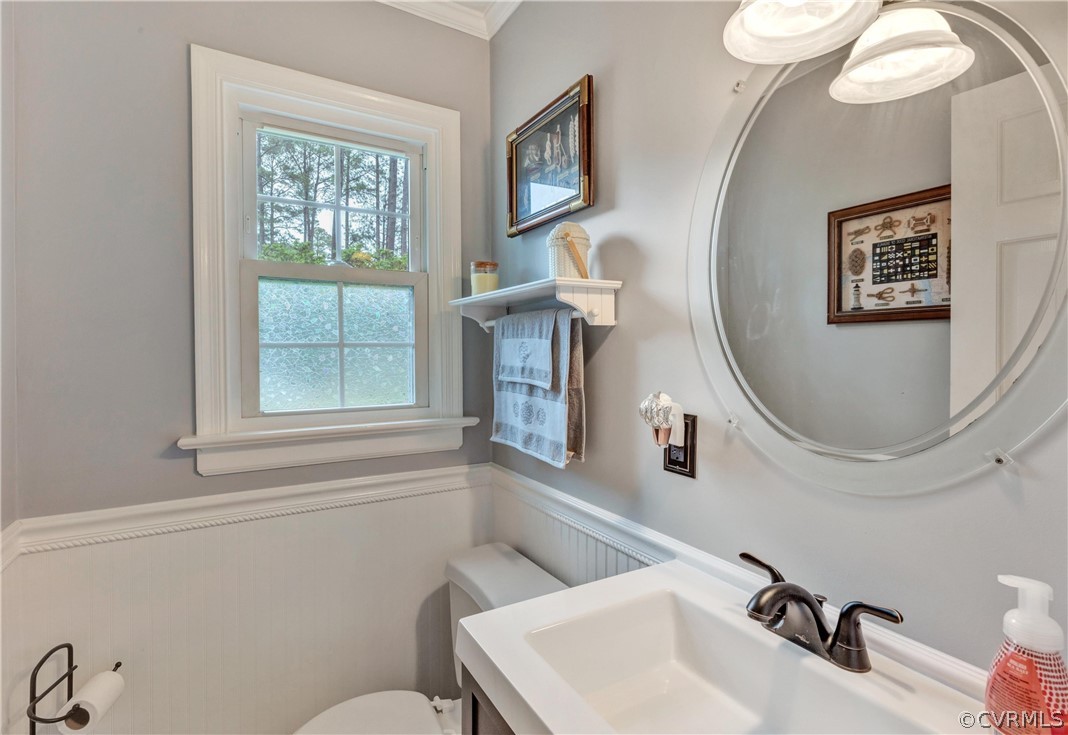 4801 Wilconna Road Chesterfield, VA 23832 - Photo 13 of 25 a bathroom with a sink mirror and window